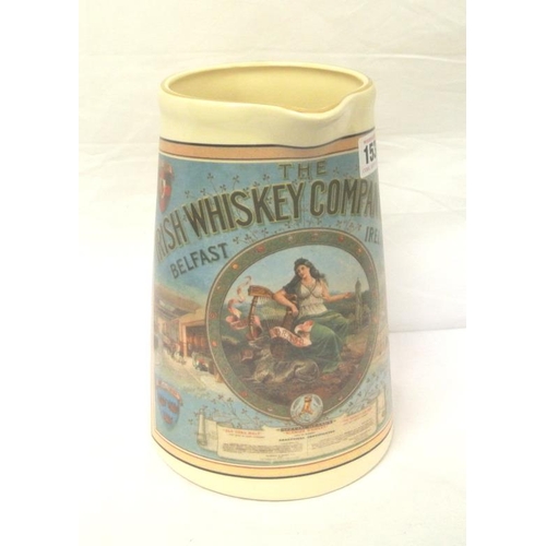 73 - 'Irish Whiskey Company, Belfast, Ireland' advertising  jug with shaped handle