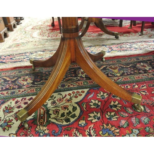 100 - Edwardian design mahogany twin pillar dining table with reeded borders, two extra leaves inset, rais... 