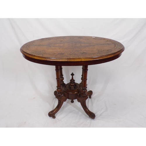 119 - Victorian oval walnut occasional table with ornate scroll and string inlay, on four turned shaped co... 