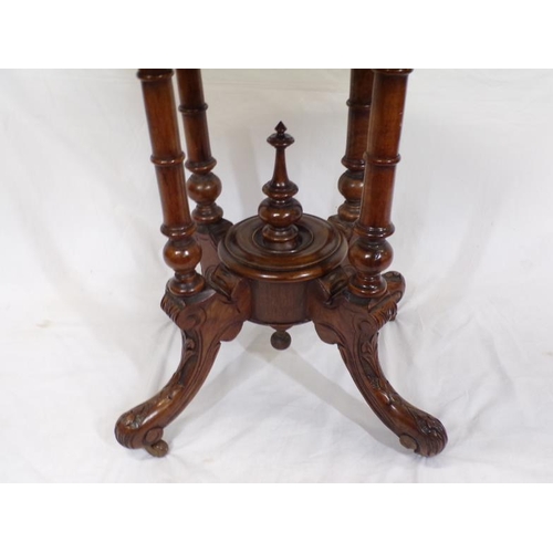 119 - Victorian oval walnut occasional table with ornate scroll and string inlay, on four turned shaped co... 