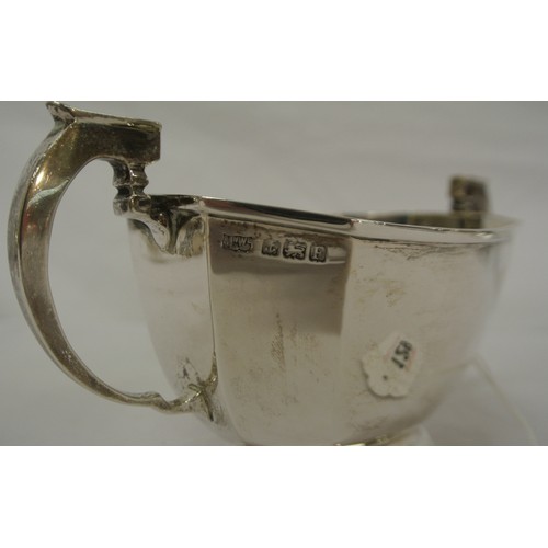 267 - Birmingham silver oval two handled bowl with tapering body, shaped handles, on oval spreading base, ... 