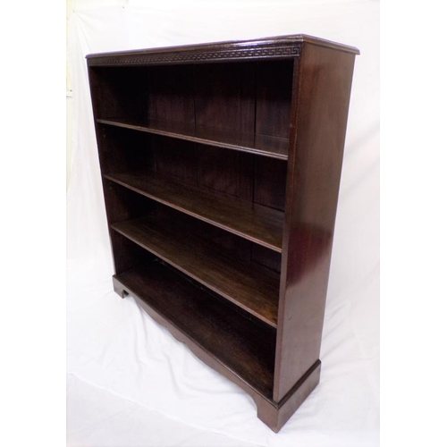 10 - Edwardian mahogany bookcase with Chinese Chippendale style frieze, adjustable reeded shelving, on br... 