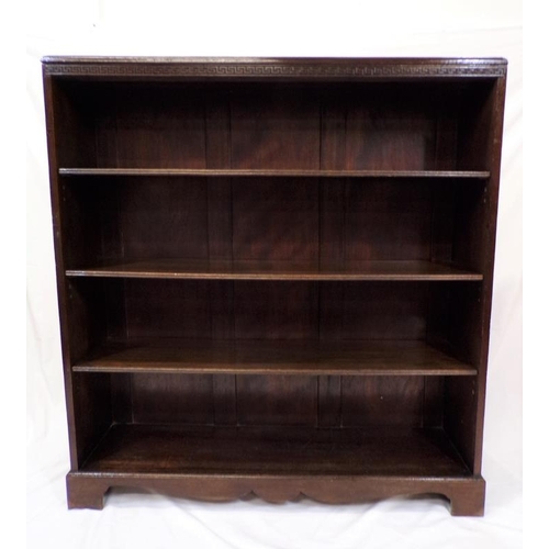 10 - Edwardian mahogany bookcase with Chinese Chippendale style frieze, adjustable reeded shelving, on br... 