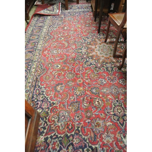 114 - Large red ground hand woven Persian Mashad carpet traditional floral design 395x 295cm