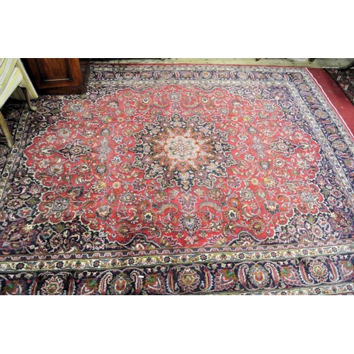 114 - Large red ground hand woven Persian Mashad carpet traditional floral design 395x 295cm