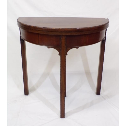 124 - Edwardian mahogany demi lune card table with fold-over top, pull-out support, reeded borders, on squ... 