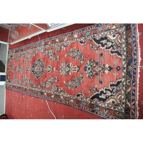 134 - Red and blue ground hand woven Iranian runner with floral design