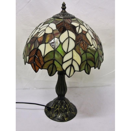 174 - Art Deco style electric table lamp with ornate multi-coloured domed shade and round base