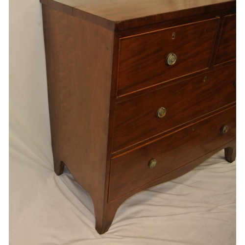 181 - Georgian mahogany chest of two short and two long drawers with ornate brass drop handles, on bracket... 