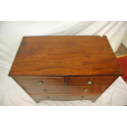 181 - Georgian mahogany chest of two short and two long drawers with ornate brass drop handles, on bracket... 