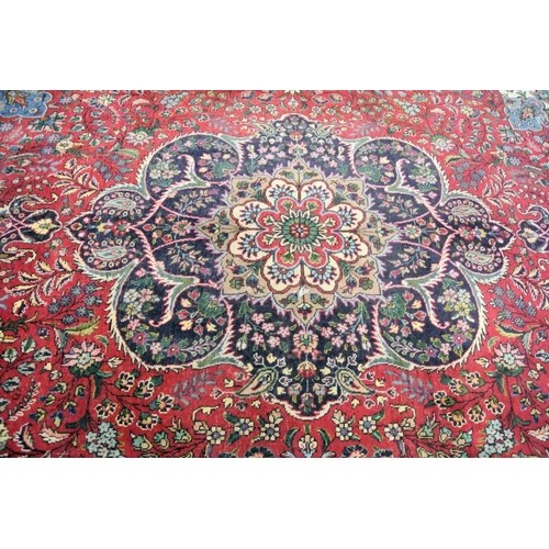 183 - Large multi coloured ground Persian Tabriz carpet with bespoke floral desing