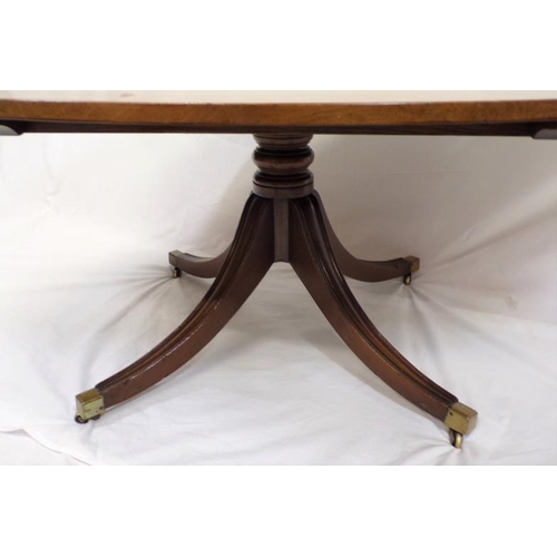 19 - Edwardian style oval inlaid mahogany coffee or centre table on shaped column, on reeded splayed quad... 