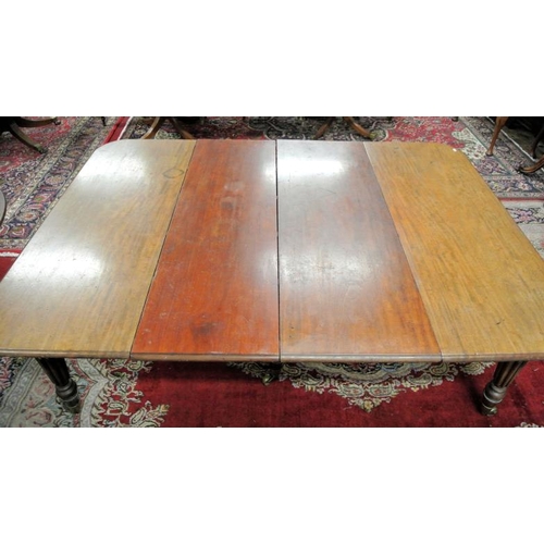 210 - Victorian mahogany extending dining table with rounded borders, two extra leaves inset, raised on fi... 