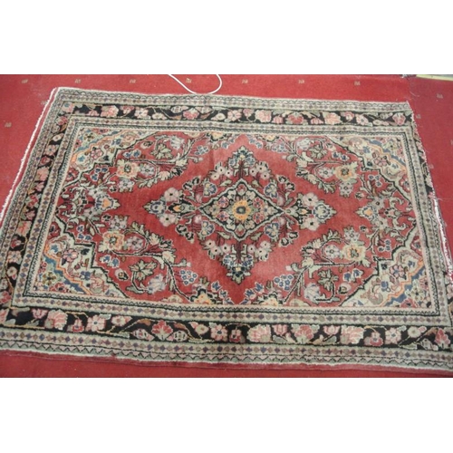 211 - Washed red gound thick pile Persian Sarouk village rug hand woven with floral design