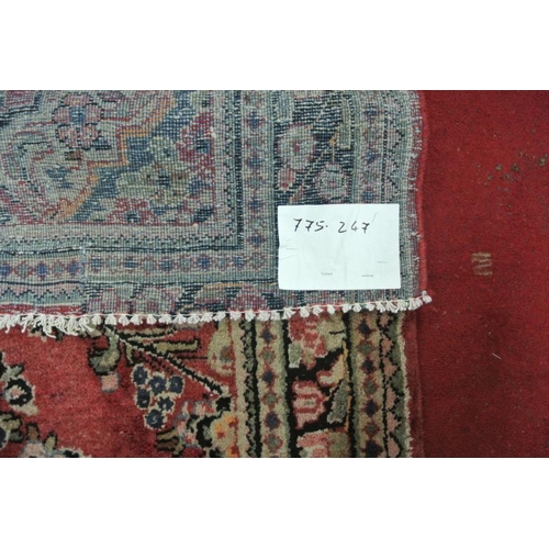 211 - Washed red gound thick pile Persian Sarouk village rug hand woven with floral design