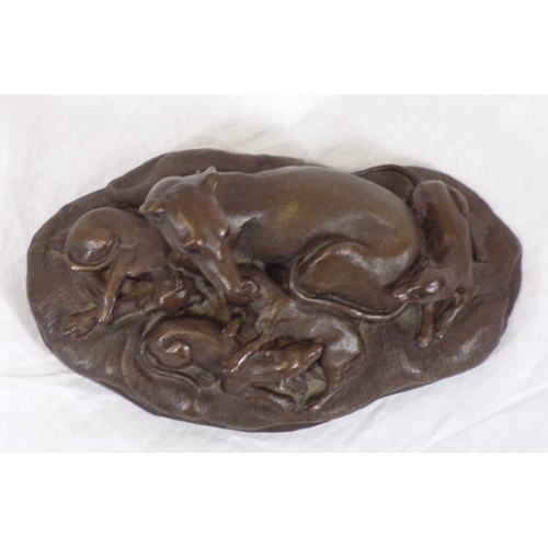 213 - Ornate bronzed group of a dog with puppies, on shaped base