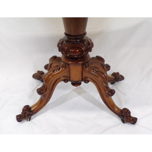 225 - Regency rosewood card table with swivel fold-over top,  round playing surface, with foliate decorate... 