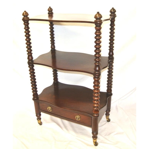 240 - Victorian mahogany three tier whatnot with barleytwist columns, serpentine sides, drawer with brass ... 