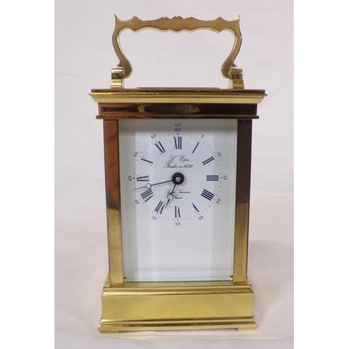 287 - French L'Epee brass cased carriage clock with shaped handle