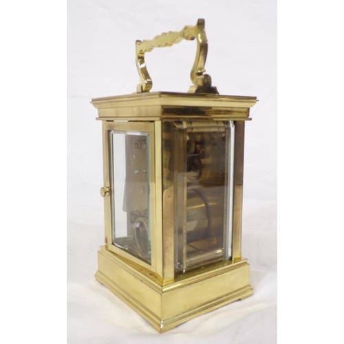 287 - French L'Epee brass cased carriage clock with shaped handle