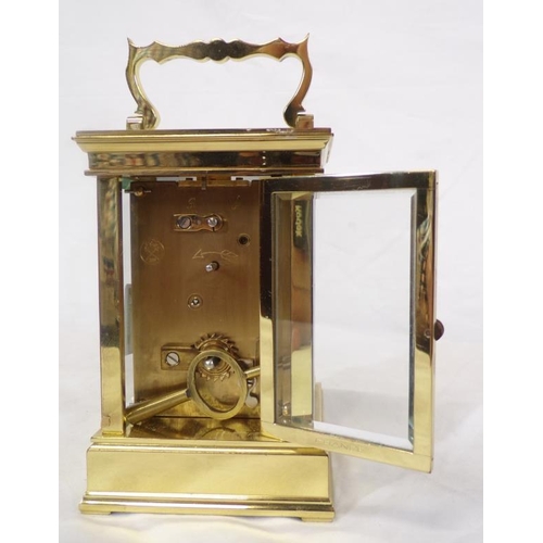 287 - French L'Epee brass cased carriage clock with shaped handle