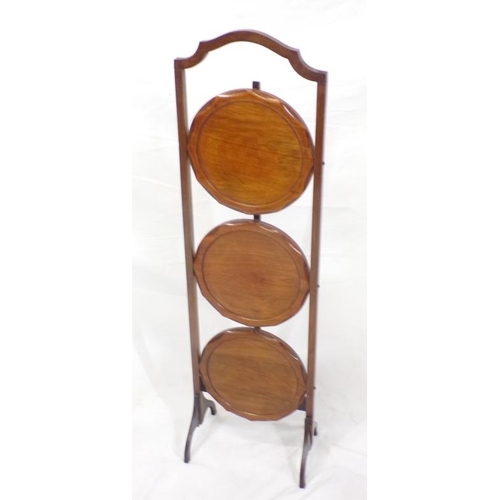 31 - Edwardian mahogany three tier round cake stand with shaped handle