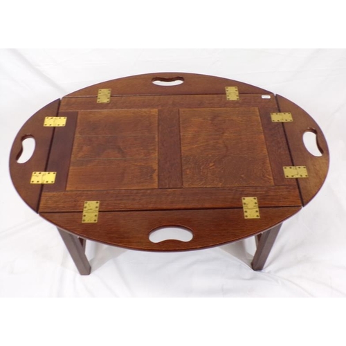 41 - Edwardian style oak ship's table on stand with fold-up sides and handles