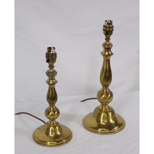 47 - Two electric brass lamps with columns and round bases