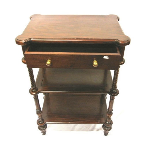 64 - Mahogany three tier whatnot with dog-ear corners, frieze drawer with brass handle, twist reeded colu... 