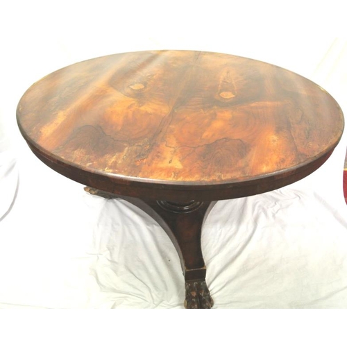 65 - Victorian mahogany dining or library table, with tip-up top, turned tapering column with collar, on ... 