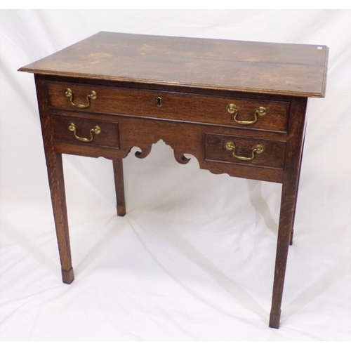 75 - Georgian oak lowboy with frieze drawer, two lower drawers, shaped apron, brass drop handles, on squa... 