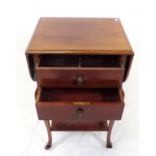 79 - Edwardian mahogany drop-leaf table with pull-out supports, two drawers with brass handles, on cabrio... 