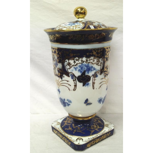 92 - Large Staffordshire urn with ornate gilt blue and white foliate decoration, lid with round finial, o... 