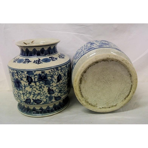 93 - Pair of Oriental style round flower vases with flared rims and ornate blue and white foliate decorat... 