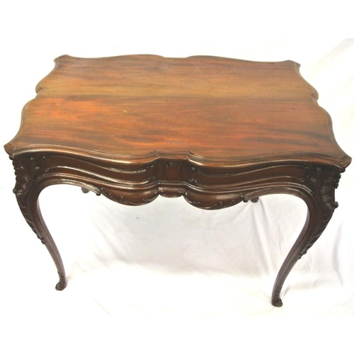 99 - Victorian mahogany centre or occasional table with serpentine borders, foliate and scroll decoration... 