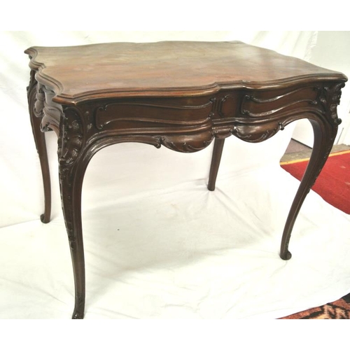 99 - Victorian mahogany centre or occasional table with serpentine borders, foliate and scroll decoration... 