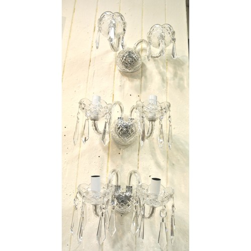 97 - Pair of Waterford Crystal cut glass five branch chandeliers with S-shaped arms, and 3 double side li... 