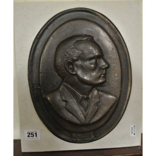 282 - Oval bronzed plaque 'Padraig Pearce' on marble backplate