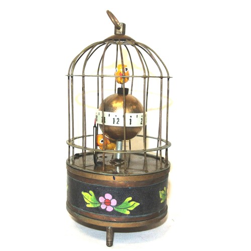 184A - Automaton birdcage clock with 2 birds and a globe in a cage