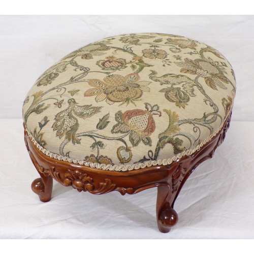 185A - Oval footstool with foliate upholstery, on cabriole legs