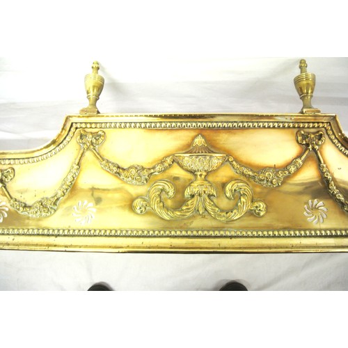 219 - Long Regency design Edwardian brass fire fender with vase finials, ornate ribbon and foliate decorat... 