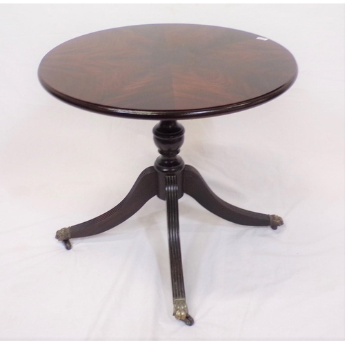 104 - Regency style round walnut occasional table with capstan top, vase turned column, on reeded quadrapo... 