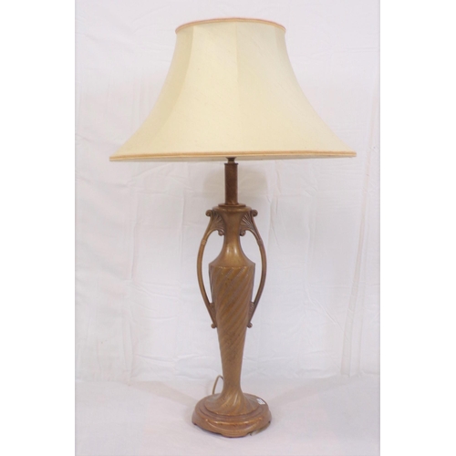 139 - Electric table lamp with shaped handles, twist reeded tapering column and round base