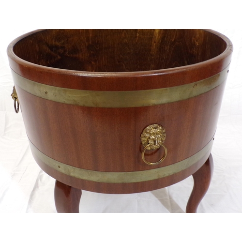 151 - Georgian design wine cooler with copper banding and lionmask brass drop handles, on cabriole legs