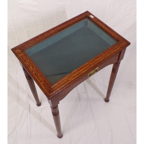 166 - Edwardian oak bijouterie table with glass topped lift-up lid, lined interior