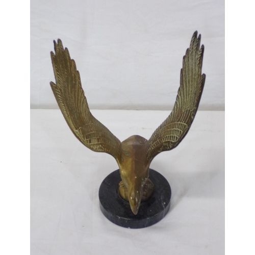 174 - Ornate brass figure of an eagle, on marble base