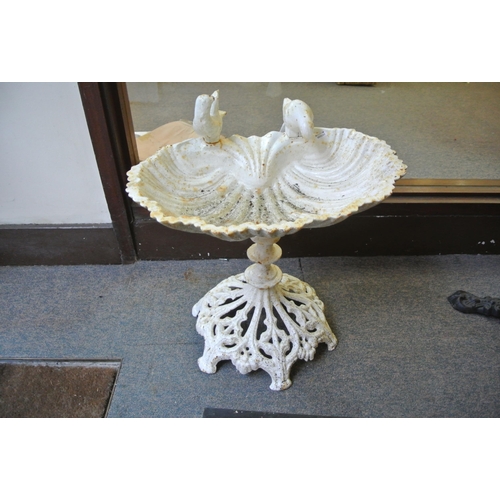 204 - Cast iron shell shaped birdbath with bird decoration and foliate decorated base