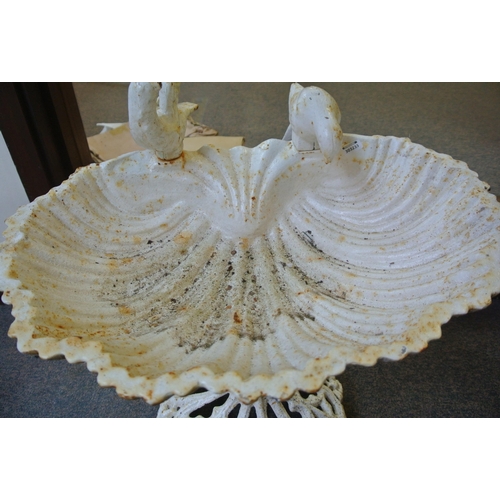 204 - Cast iron shell shaped birdbath with bird decoration and foliate decorated base