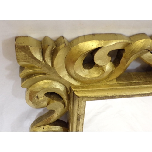 227 - Pair of ornate gilt framed mirrors with scroll decoration 82x60cm each