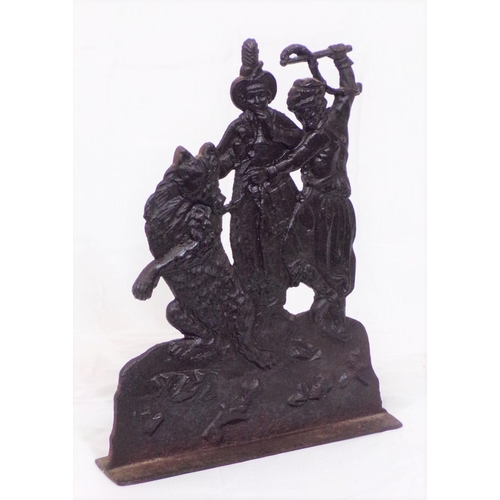 264 - Oriental cast iron door stop in the form of a Russian dancing bear